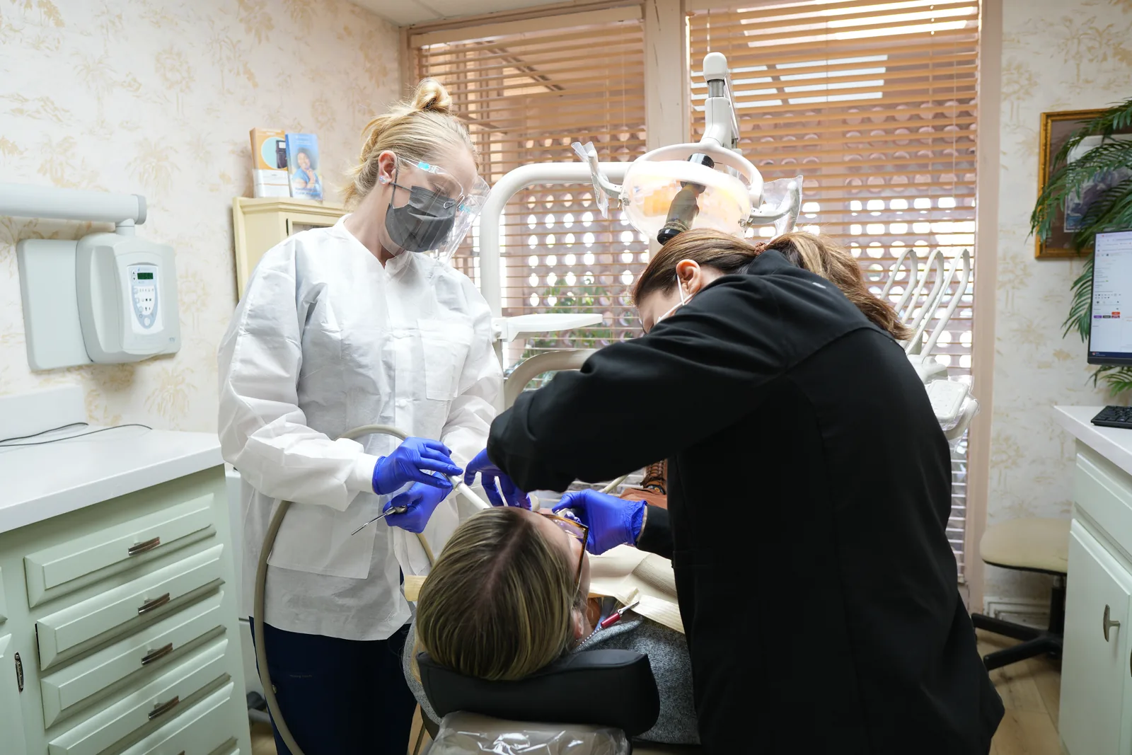 A dental exam underway at Smile Tustin by Dr. Ezzy