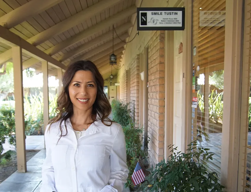 Dr. Ezzy outside the Smile Tustin by Dr. Ezzy office