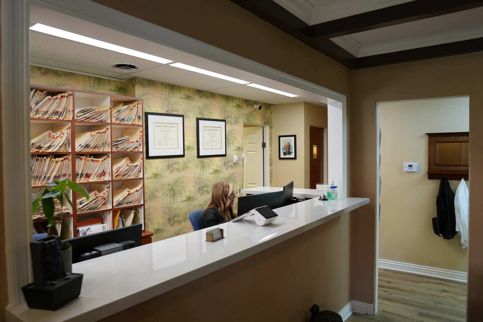 Front desk and reception at Smile Tustin by Dr. Ezzy